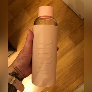 Dior glass water bottle with silicone sleeve, brand new in the box never used.